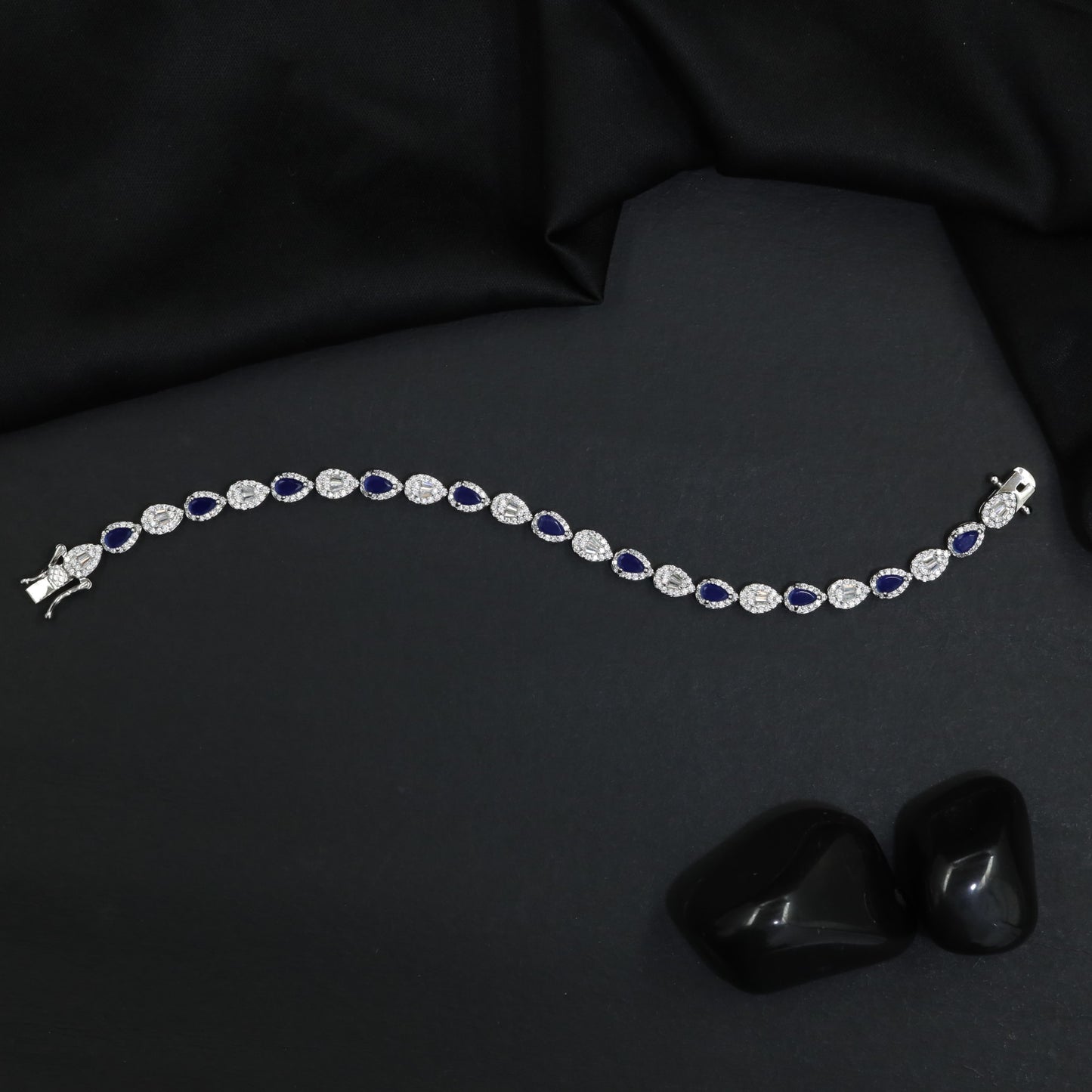 Rhodium Bracelet Featuring Alternating Navette and Leaf Elements