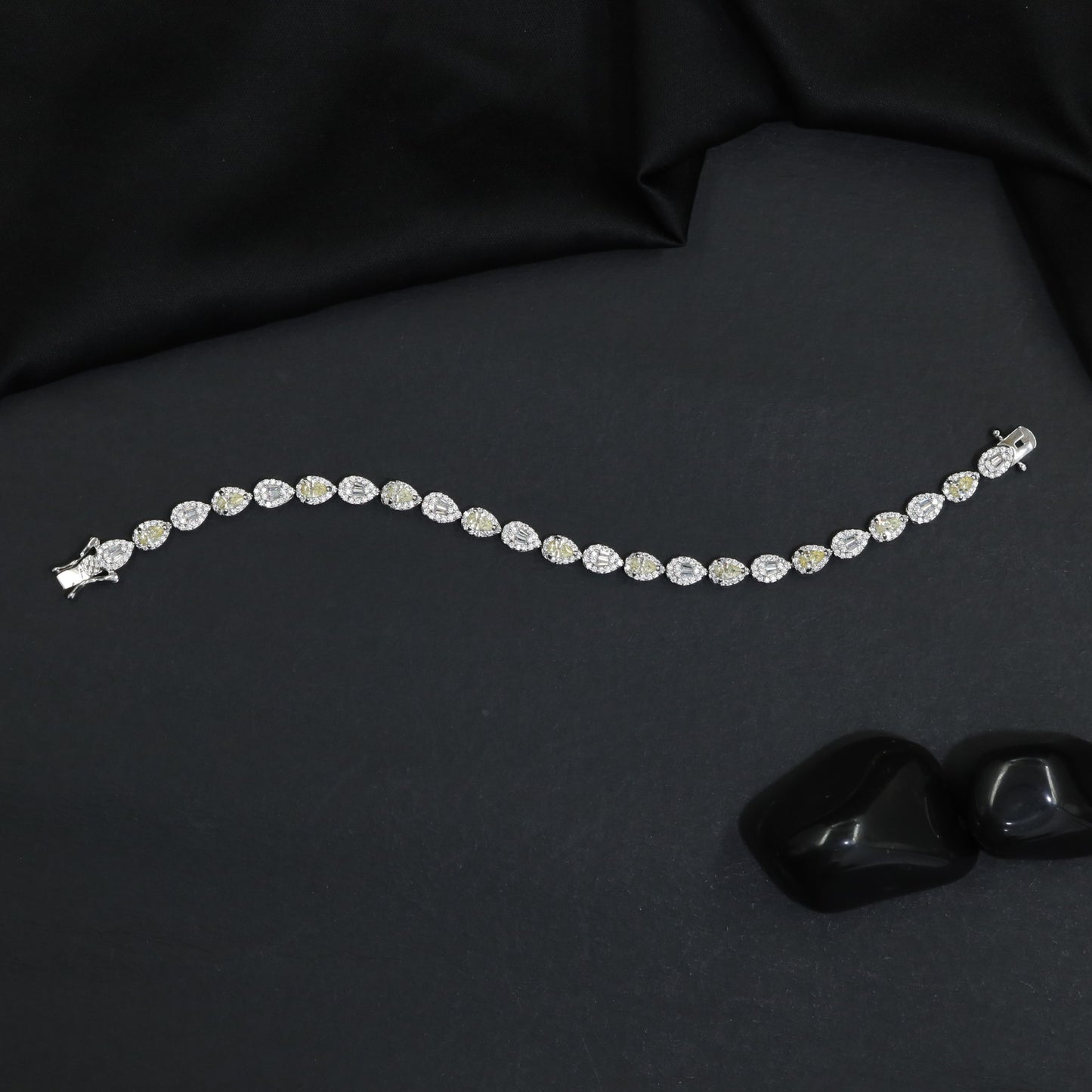 Rhodium Bracelet Featuring Alternating Navette and Leaf Elements