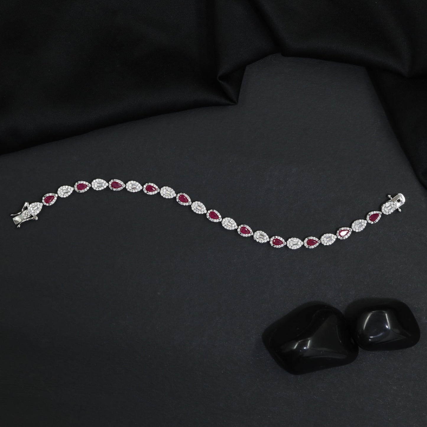 Rhodium Bracelet Featuring Alternating Navette and Leaf Elements