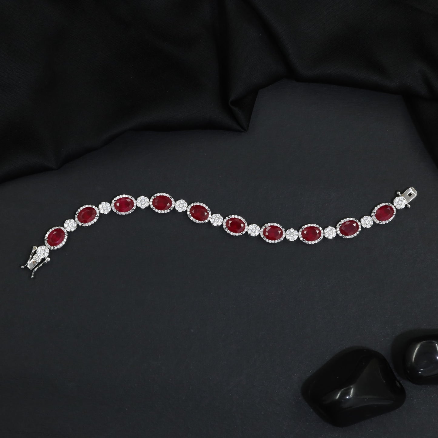 Rhodium Bracelet with Linked Oval Stations and Intricate Borders