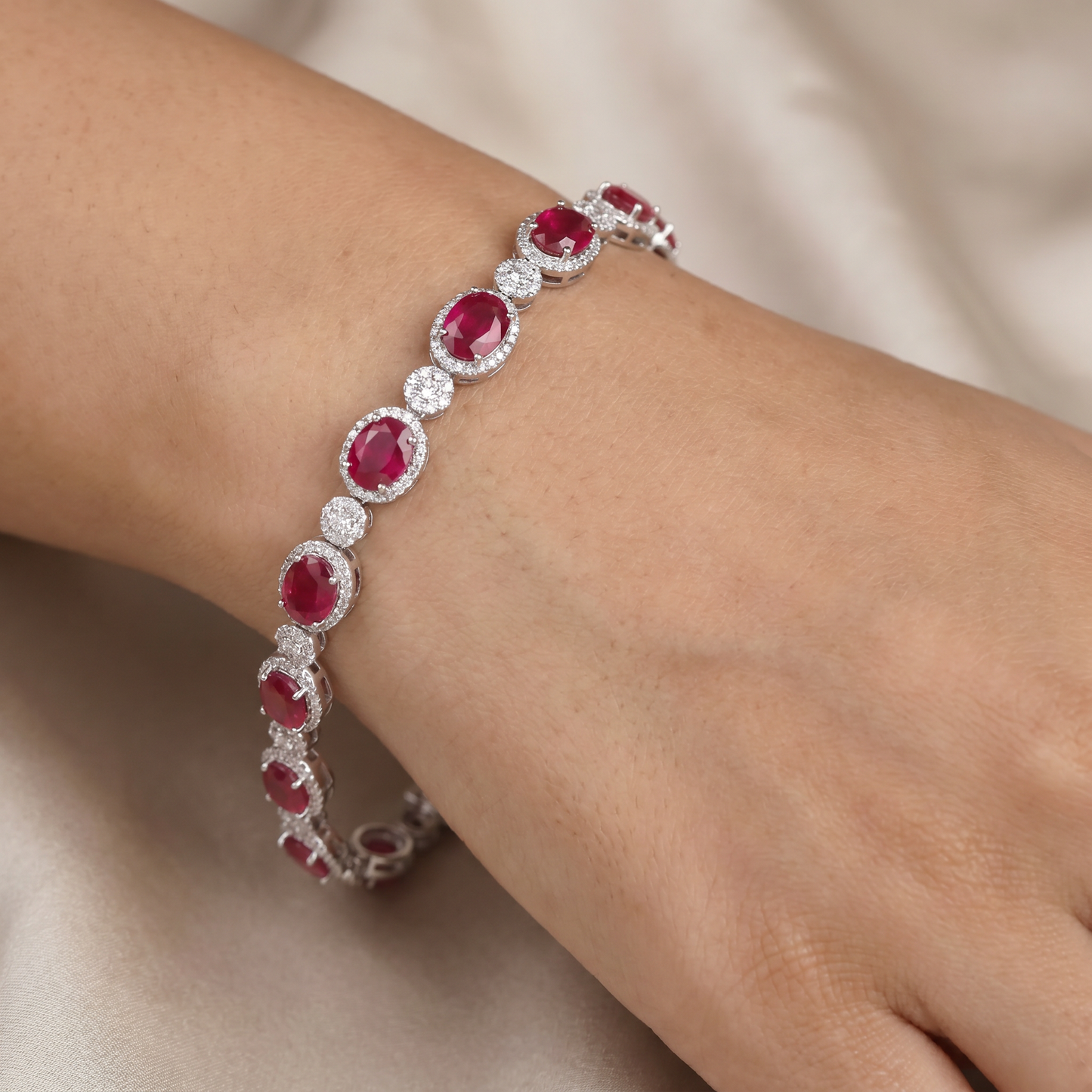Rhodium Bracelet with Linked Oval Stations and Intricate Borders