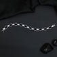Rhodium Bracelet with Linked Oval Stations and Intricate Borders