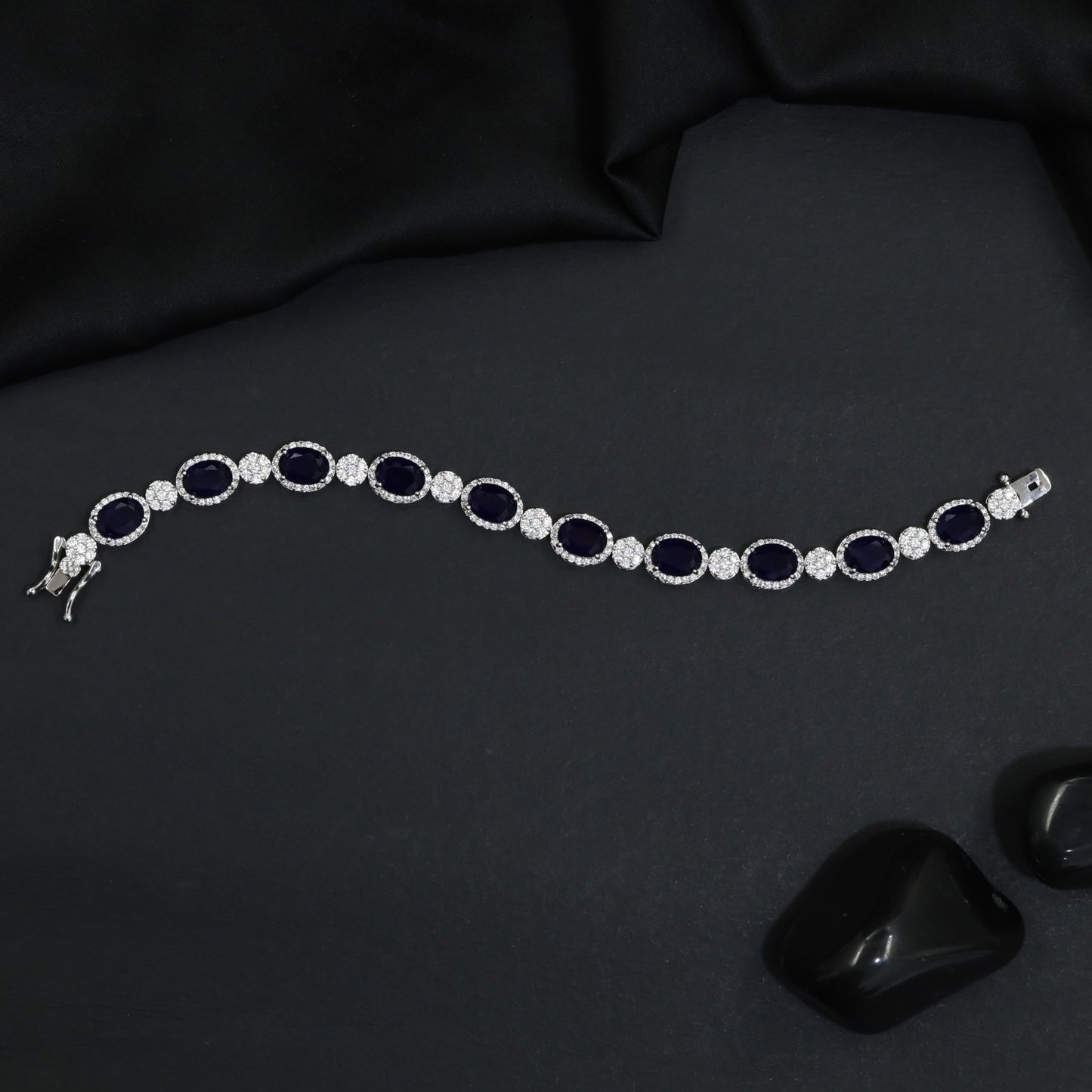 Rhodium Bracelet with Linked Oval Stations and Intricate Borders