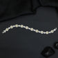 Rhodium Bracelet with Linked Oval Stations and Intricate Borders