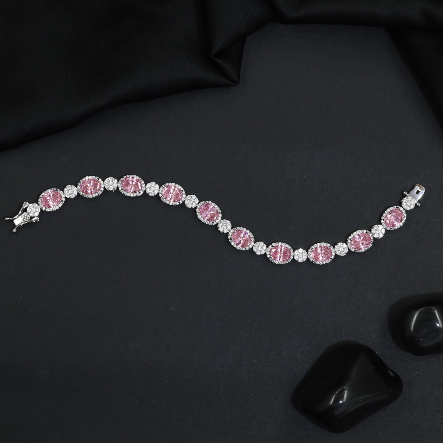 Rhodium Bracelet with Linked Oval Stations and Intricate Borders