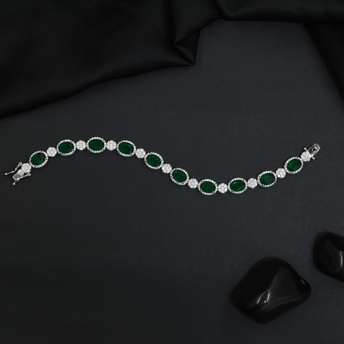 Rhodium Bracelet with Linked Oval Stations and Intricate Borders