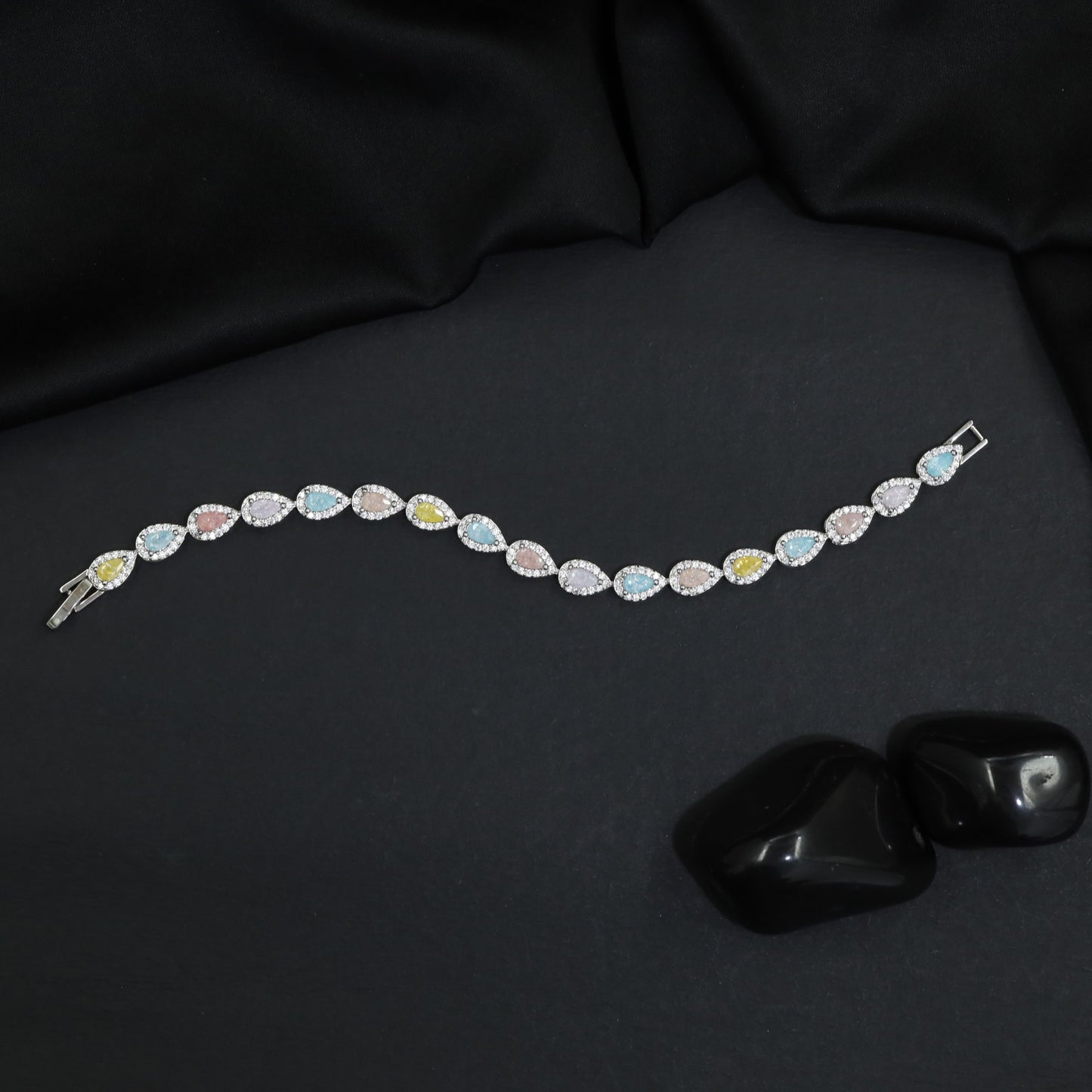 Rhodium Bracelet Featuring Leaf Shaped Link Design