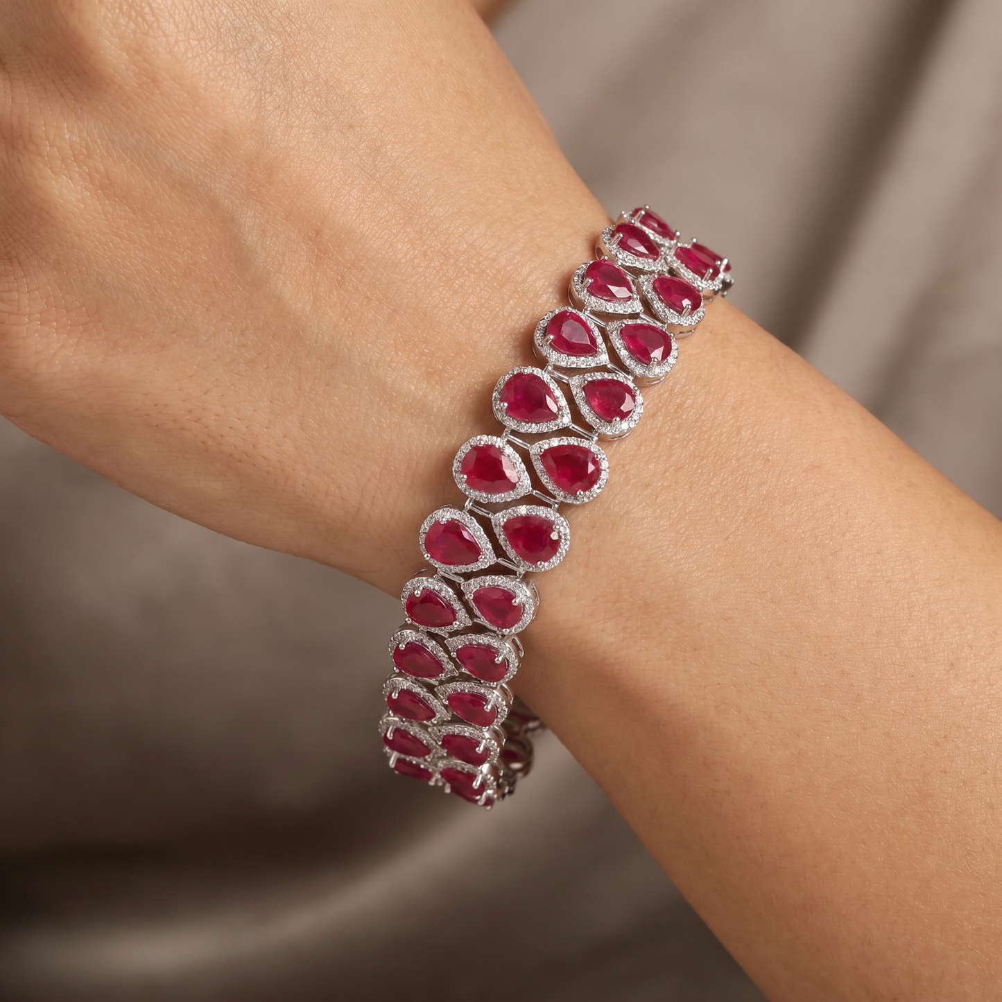 Rhodium Bracelet with Double Row Teardrop Halo Motifs