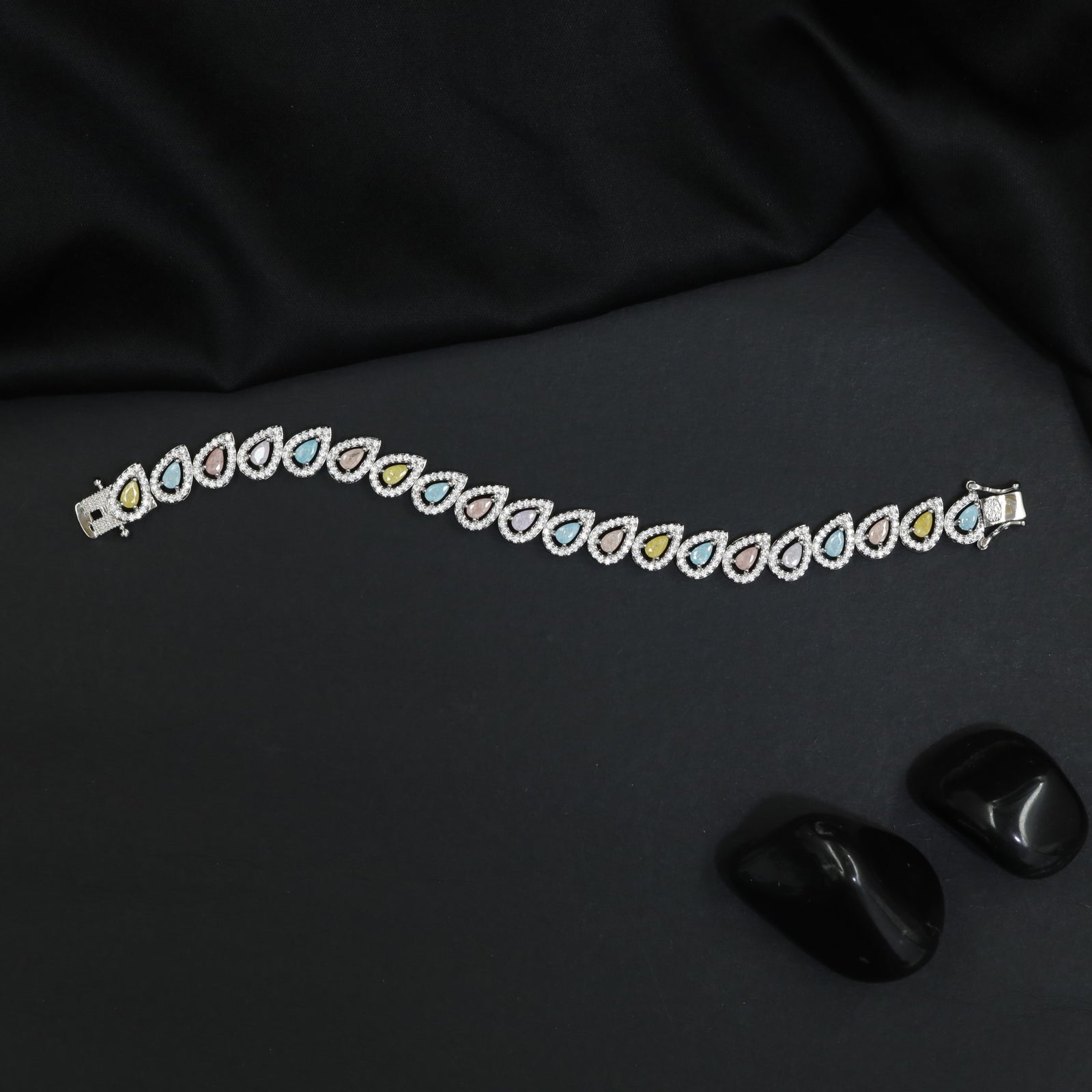 Rhodium Bracelet with Pear Shape Halo Link Design