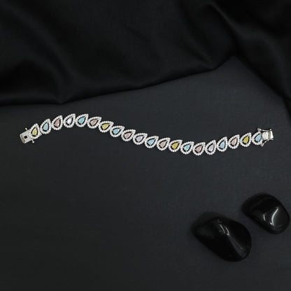 Rhodium Bracelet with Pear Shape Halo Link Design