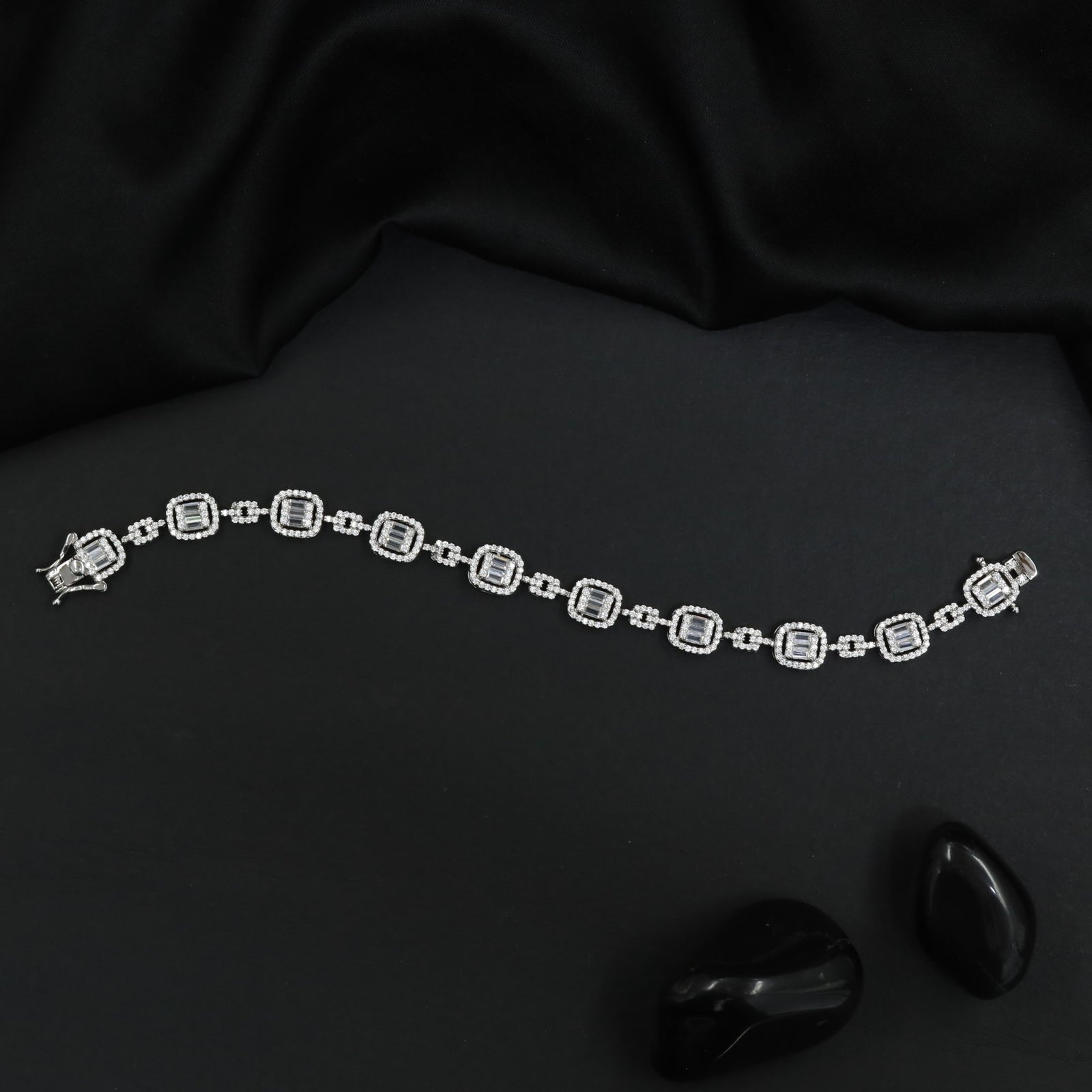 Sophisticated Rhodium Bracelet with Decorative Square Design