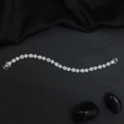 Rhodium Bracelet with Alternating Pear and Round Crystal Motifs