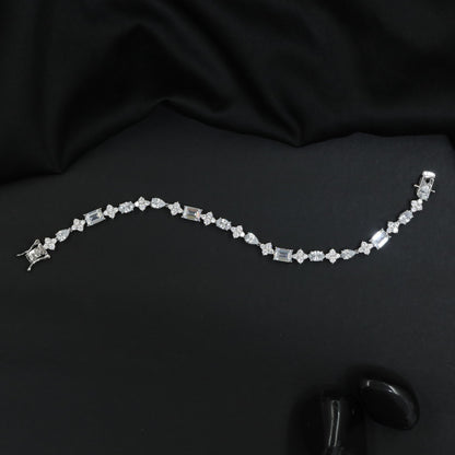 Elegant Rhodium Bracelet with Emerald Cut Crystal Accents