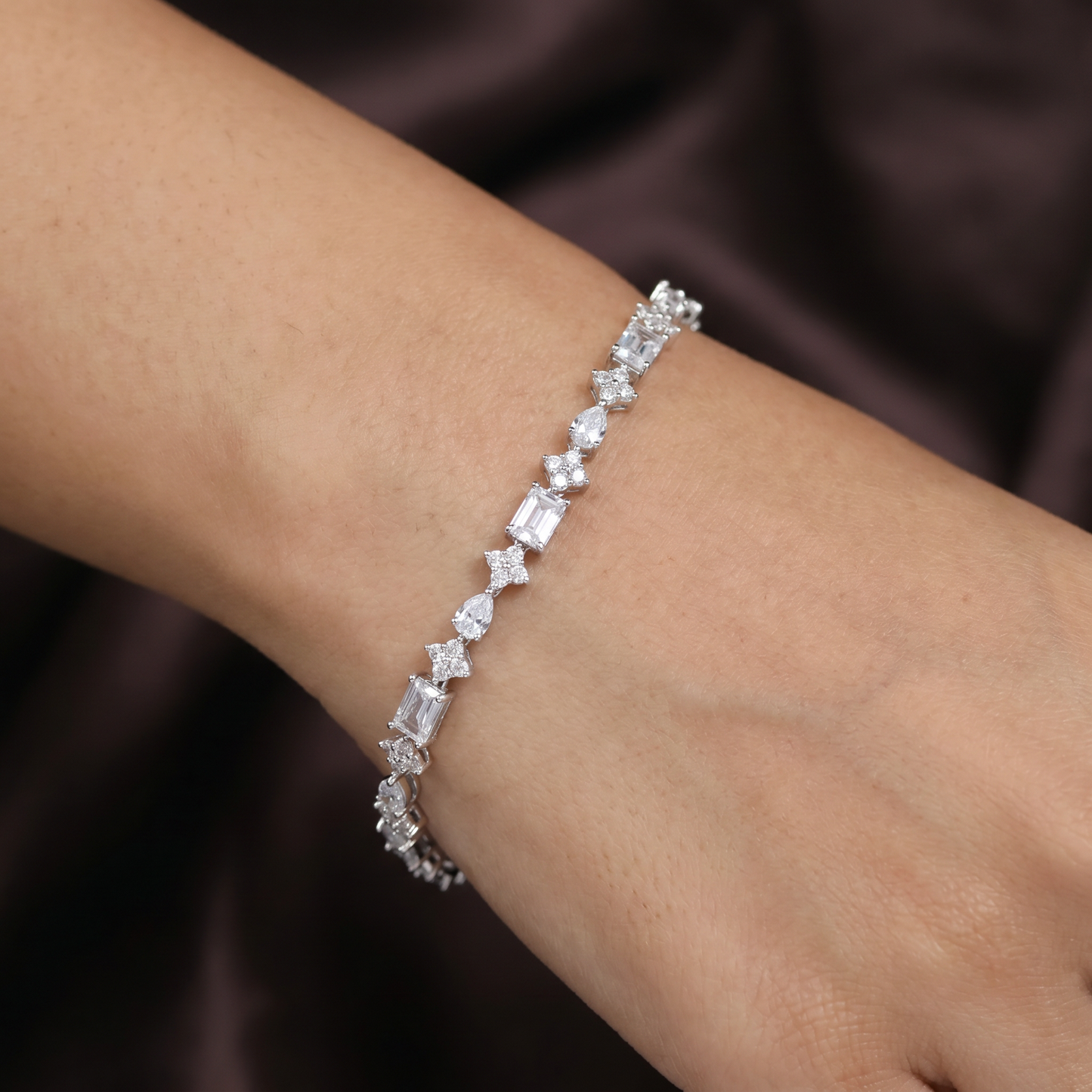 Elegant Rhodium Bracelet with Emerald Cut Crystal Accents