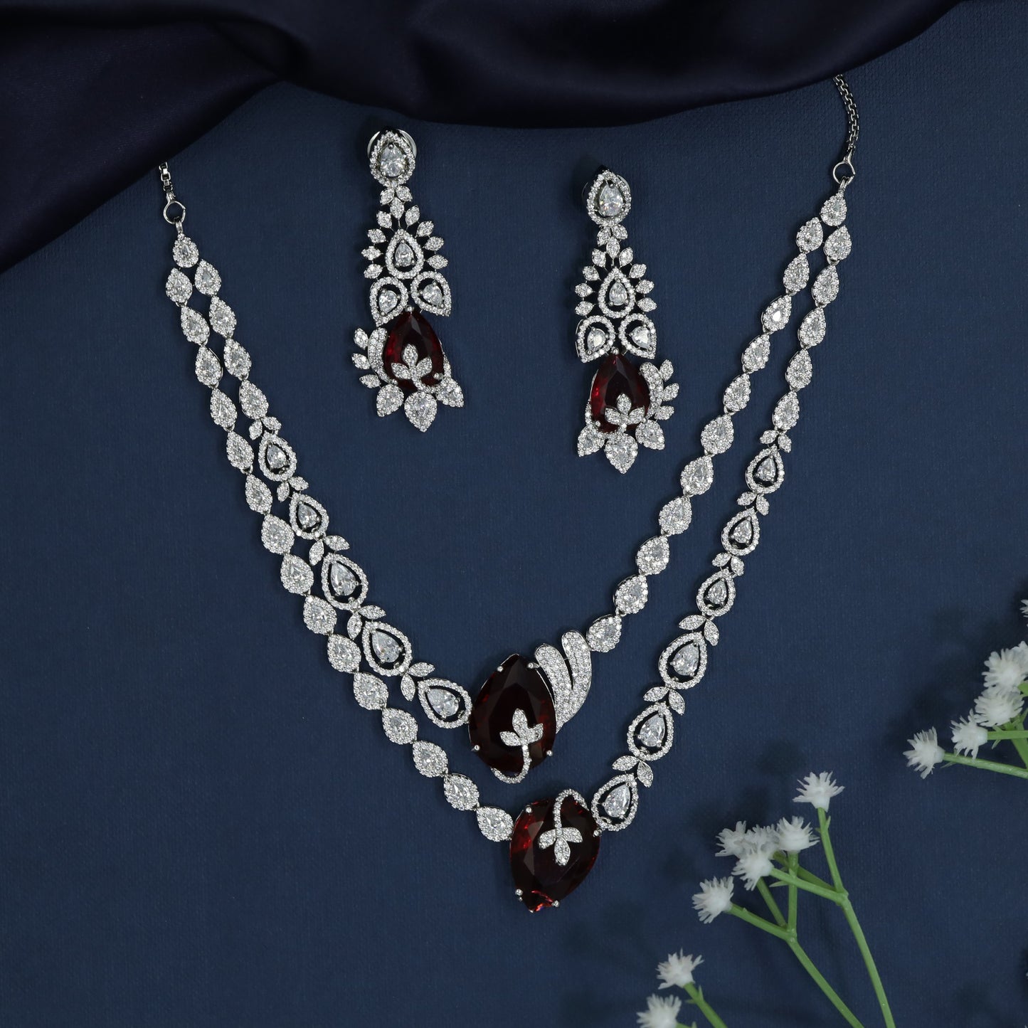 Elegant rhodium necklace highlighting radiant gemstone accents