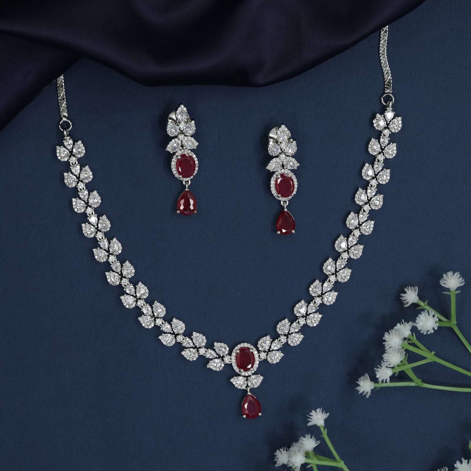 Regal rhodium necklace with layered leaf artistry