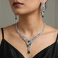 Couture rhodium necklace showcasing structured pendant framework