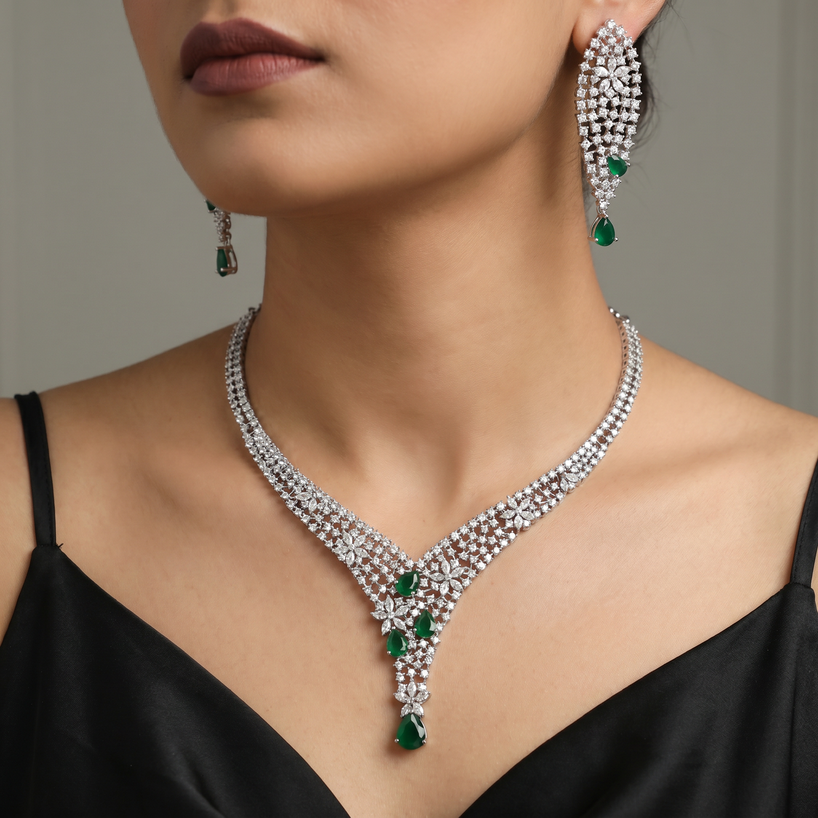 Couture rhodium necklace showcasing structured pendant framework