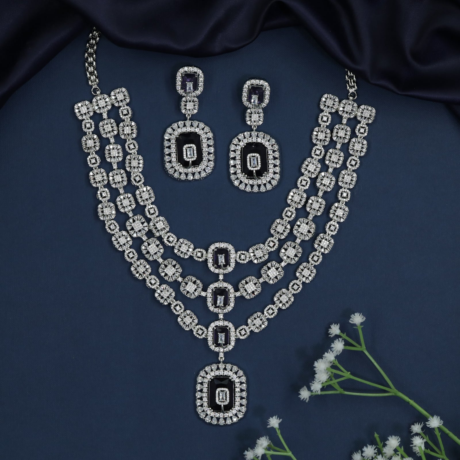 Triple Drape Rhodium Necklace with Oval Halo Construction