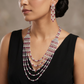 Rhodium long haara with articulated strands and balanced drape