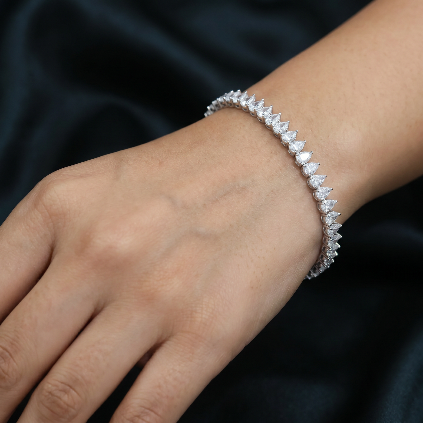 Rhodium Bracelet with Pear Cut Crystal Link Design