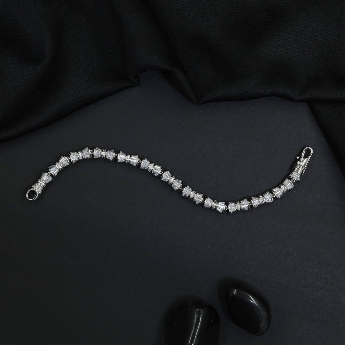 Rhodium Bracelet Featuring Alternating Baguette Knot Links