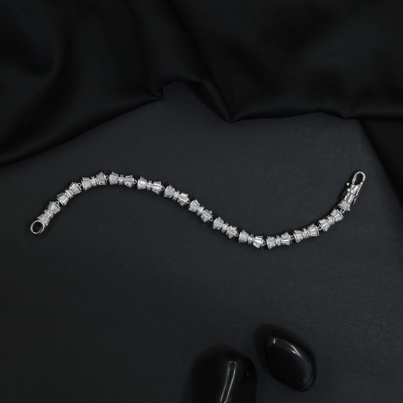 Rhodium Bracelet Featuring Alternating Baguette Knot Links