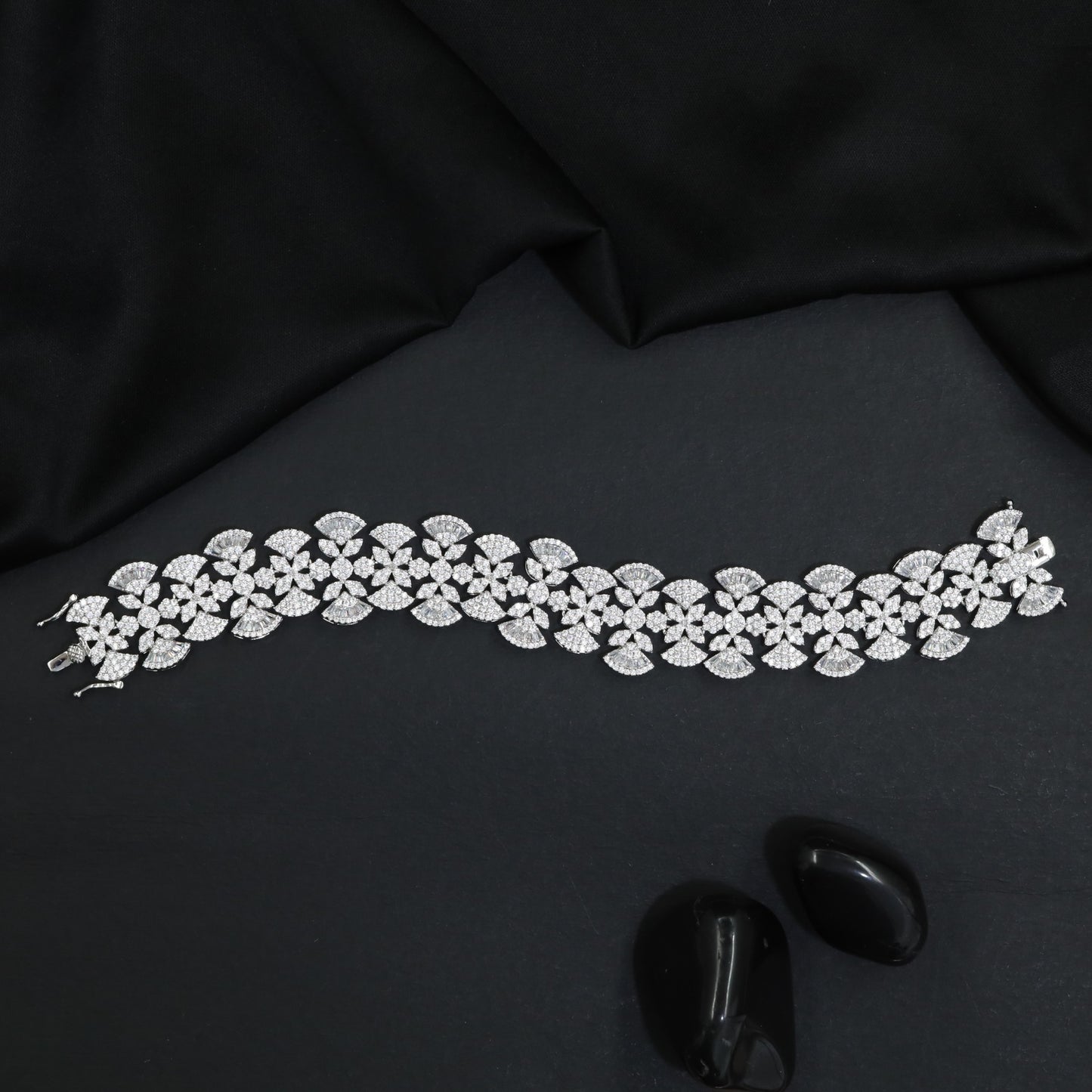 Rhodium Bracelet Featuring Bloom and Leaf Inspired Motifs
