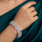 Rhodium Bracelet Featuring Bloom and Leaf Inspired Motifs