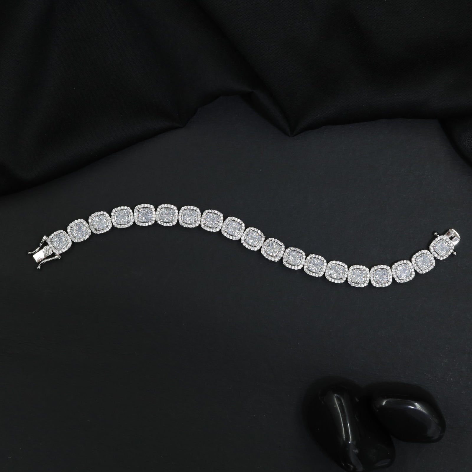 Rhodium Bracelet Featuring Continuous Cushion Halo Links