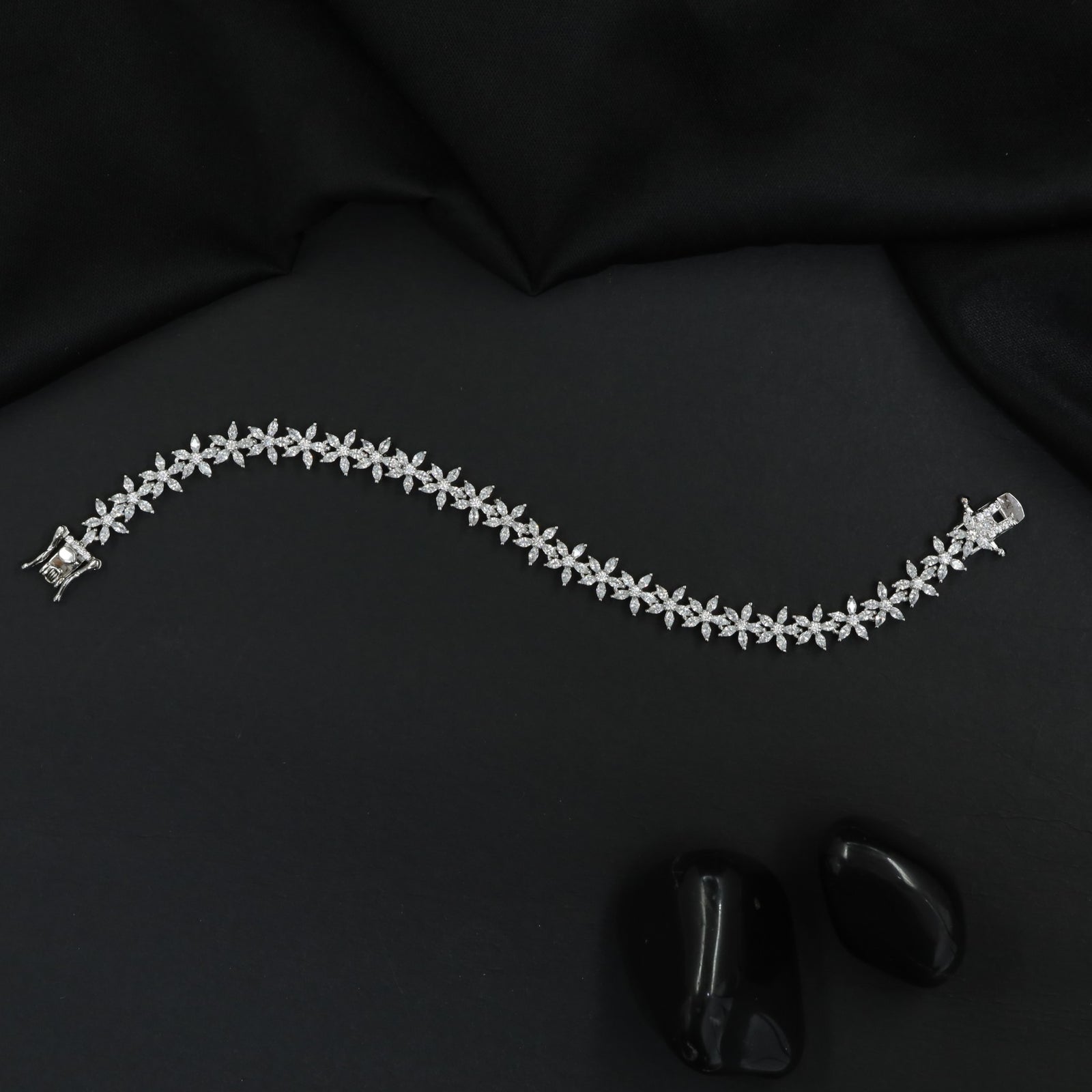 Rhodium Bracelet Featuring Continuous Floral Vine Design