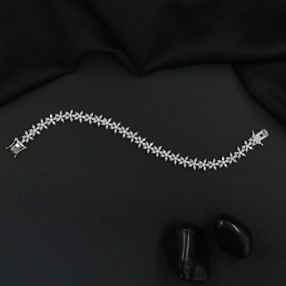 Rhodium Bracelet Featuring Continuous Floral Vine Design