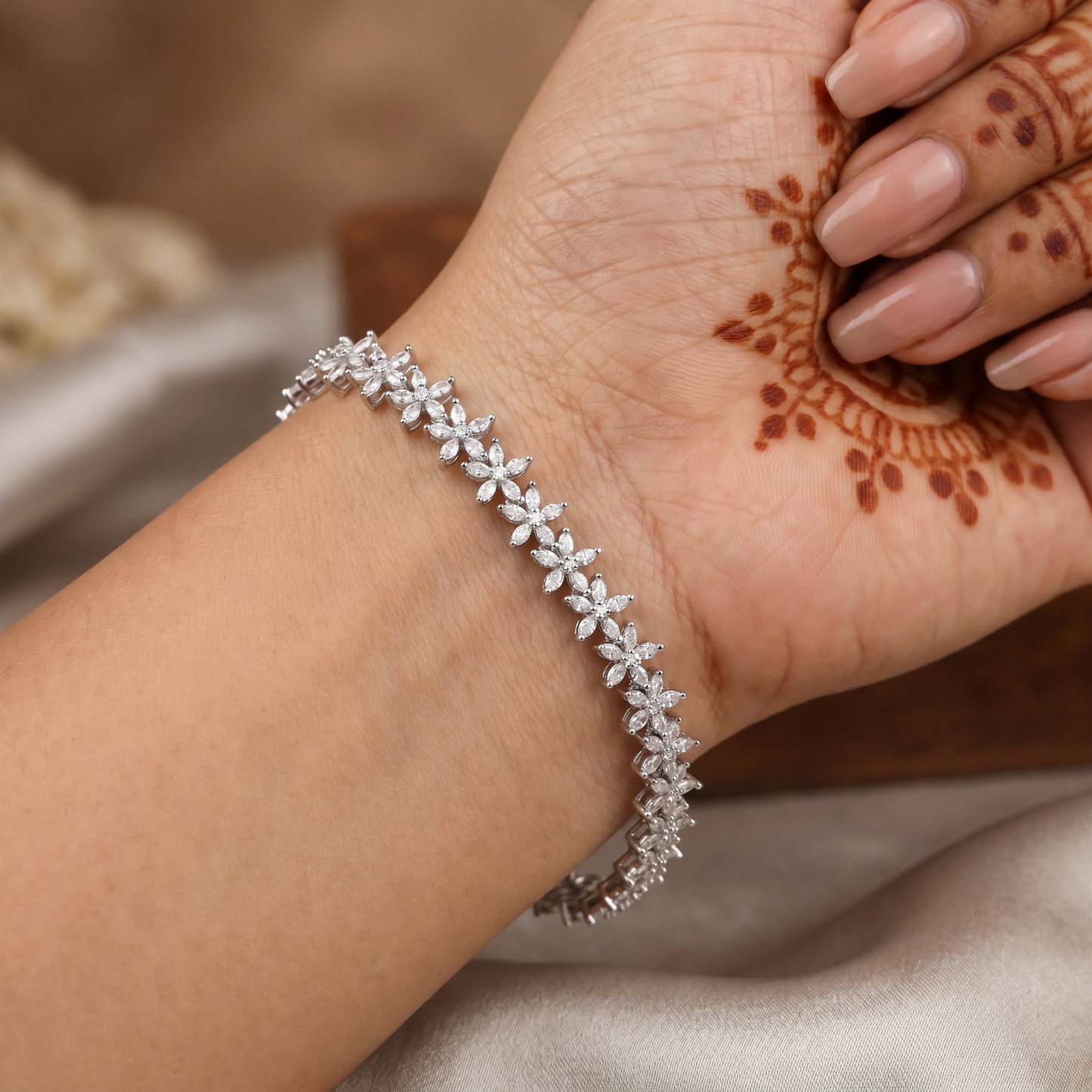 Rhodium Bracelet Featuring Continuous Floral Vine Design