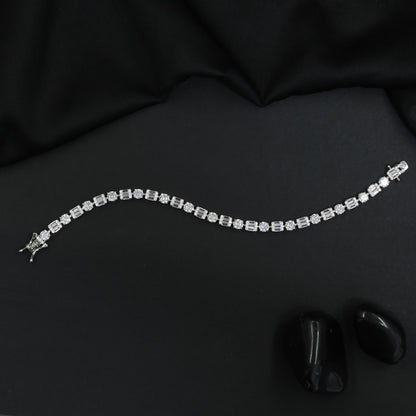 Rhodium Bracelet with Alternating Floral and Geometric Design