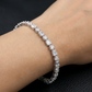 Rhodium Bracelet with Alternating Floral and Geometric Design