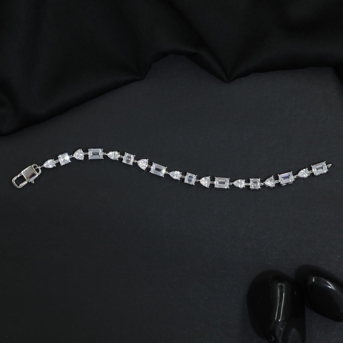Rhodium Bracelet with Alternating Geometric and Pear Elements