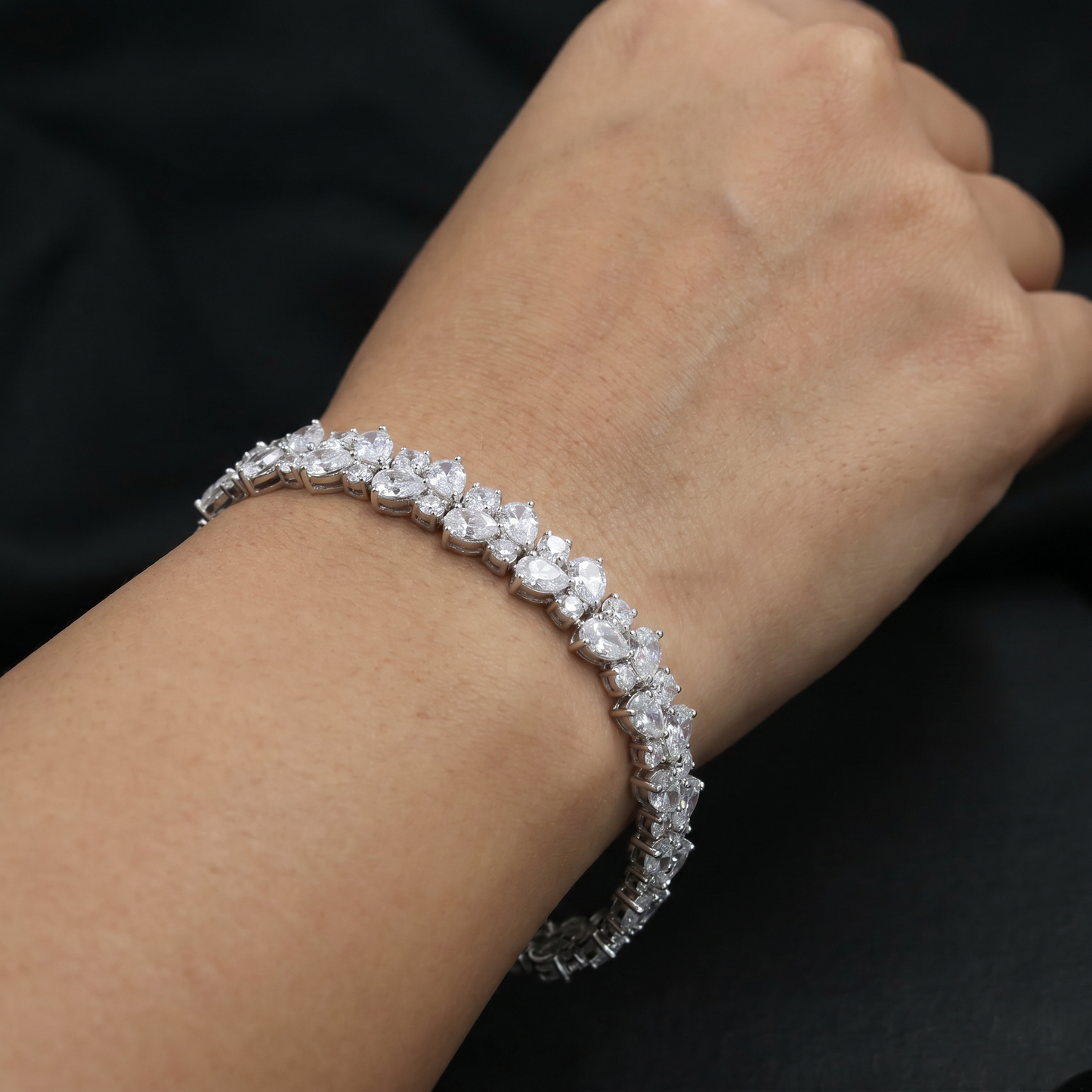 Rhodium Bracelet with Repeating Pear Cluster Arrangement