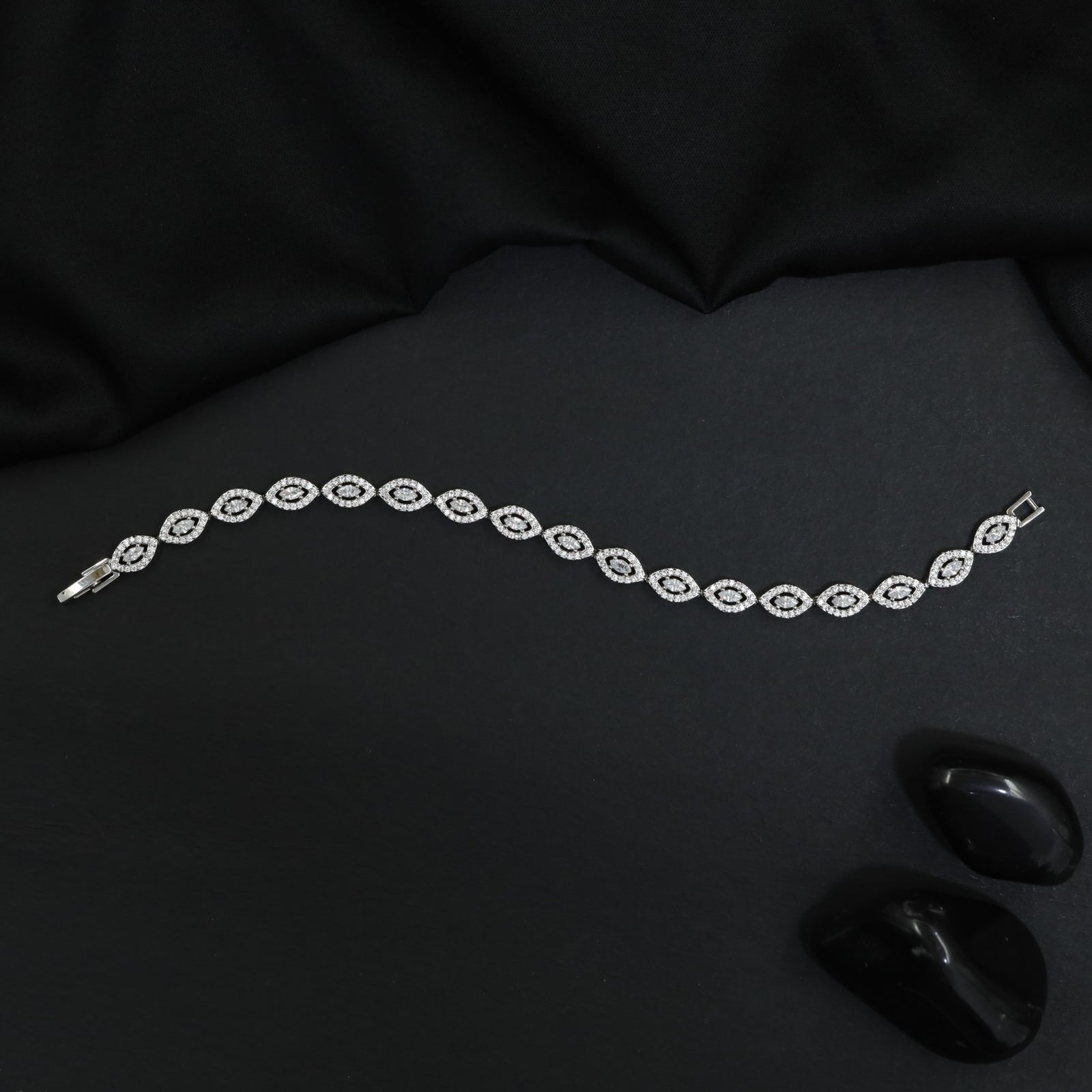 Rhodium Bracelet Showcasing Repeating Marquise Motifs