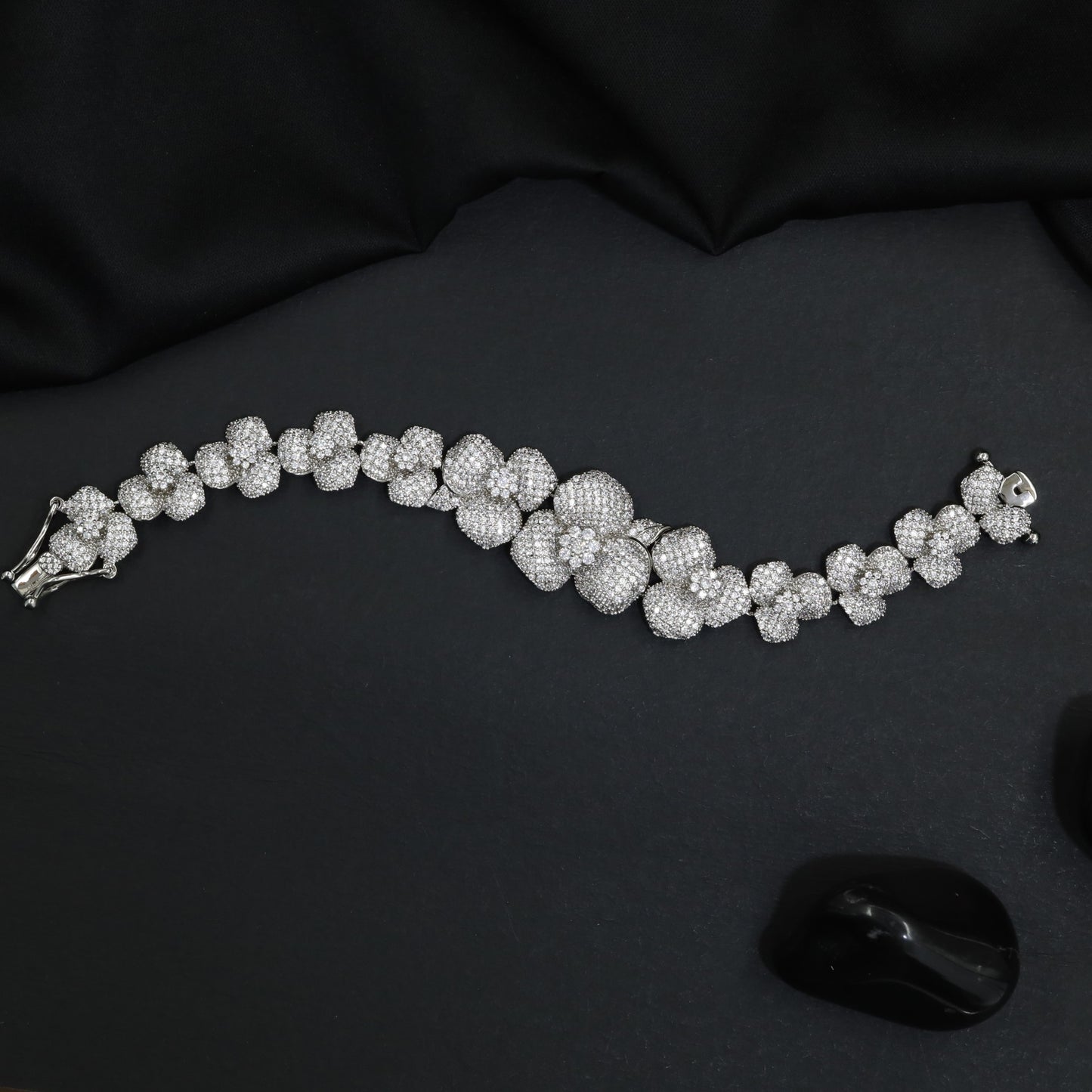 Rhodium Bracelet with Graduated Floral Cluster Motifs