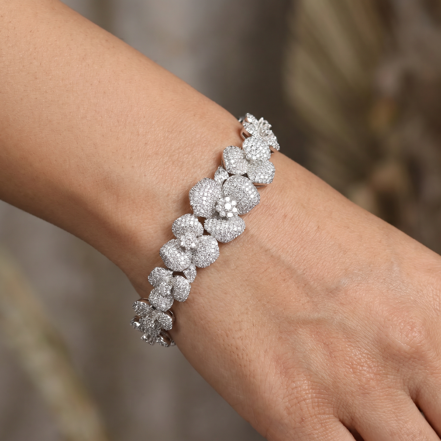 Rhodium Bracelet with Graduated Floral Cluster Motifs