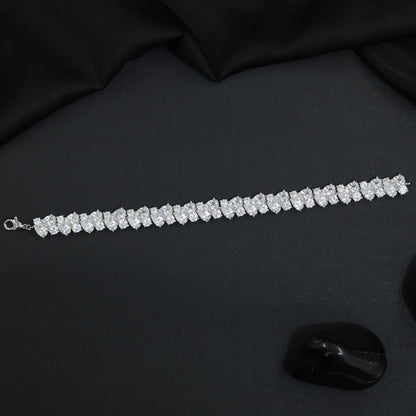 Rhodium Bracelet Showcasing Alternating Pear Clusters