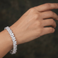 Rhodium Bracelet Showcasing Alternating Pear Clusters