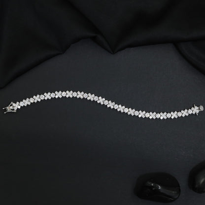 Rhodium Bracelet with Continuous Floral Arrangement and Refined Finish
