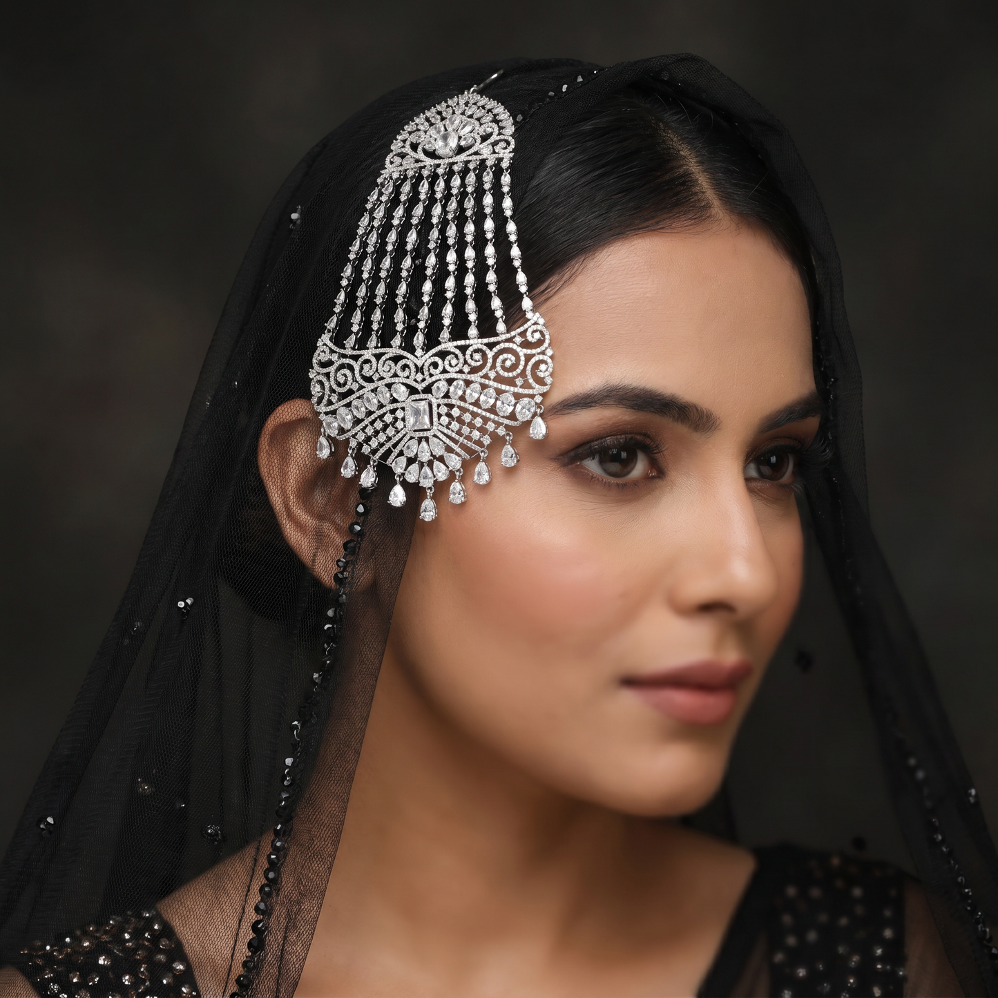 Jhumar with Scrollwork Design and Cascading Tassel Strands