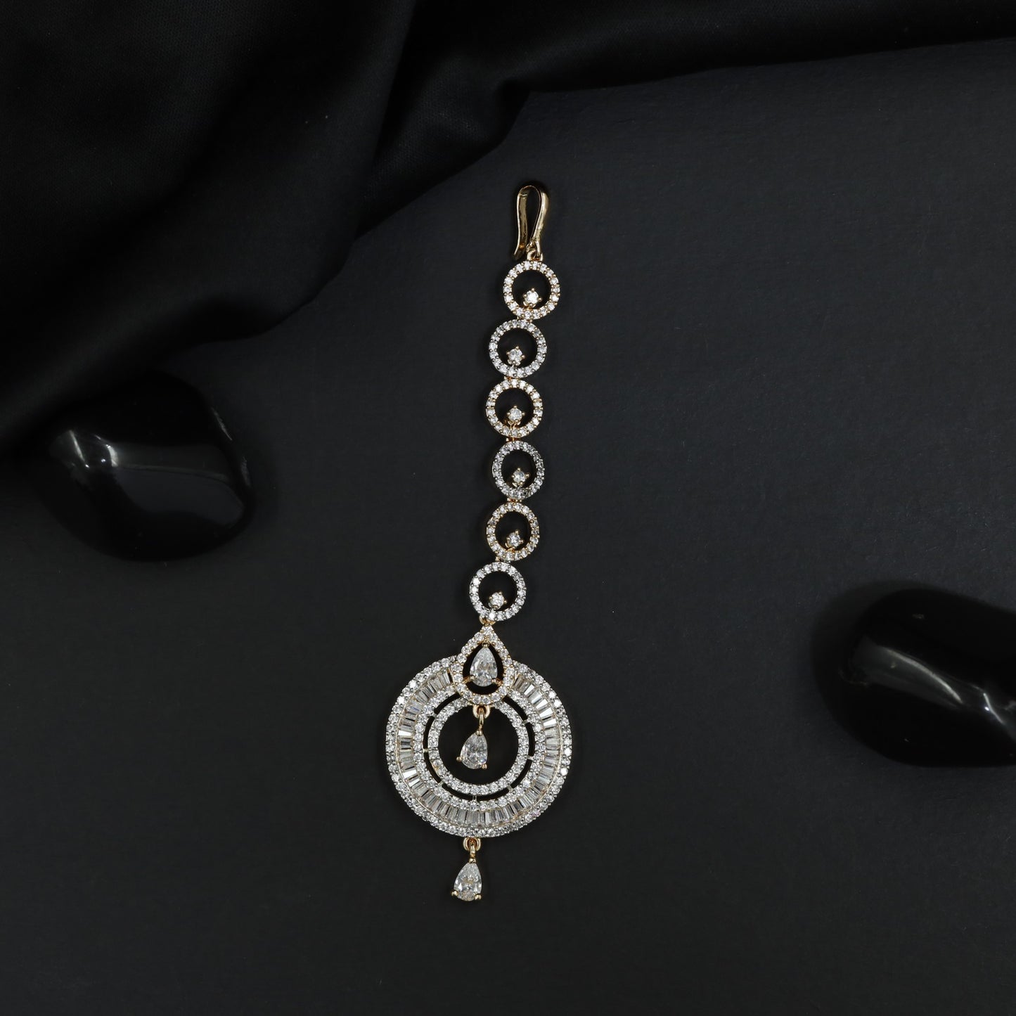 Tikka Featuring Open Circle Pattern and Decorative Drops