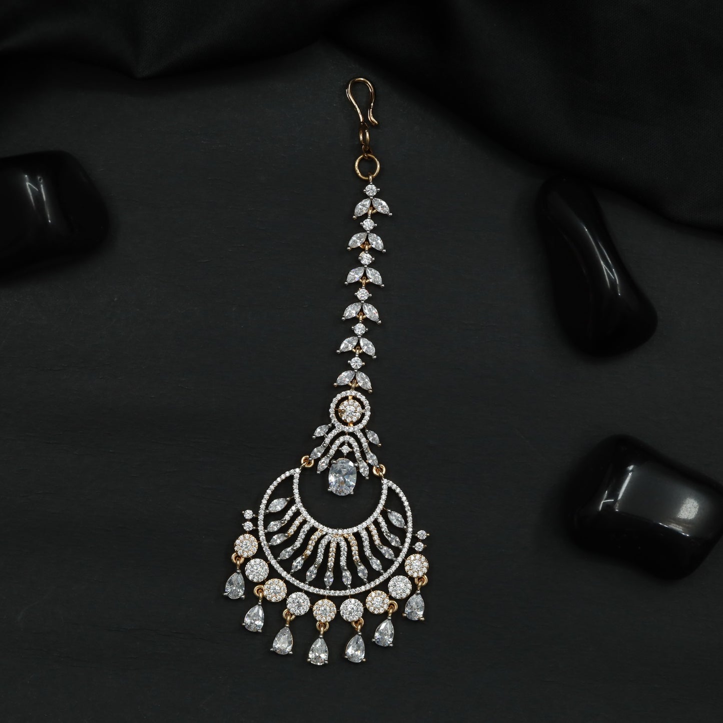 Tikka Featuring Layered Crescent Motifs and Fringe Detail