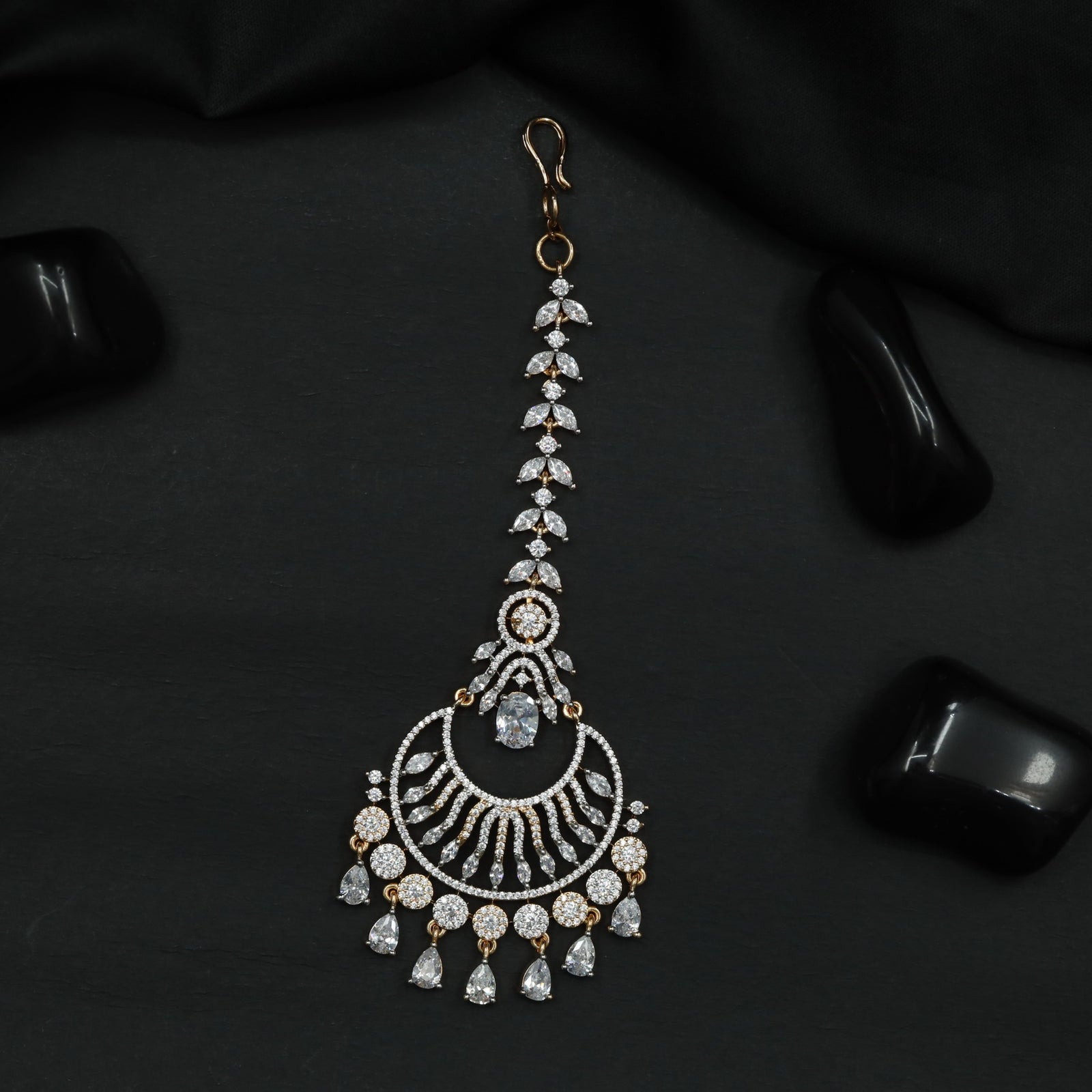 Tikka Featuring Layered Crescent Motifs and Fringe Detail
