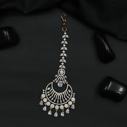 Tikka Featuring Layered Crescent Motifs and Fringe Detail