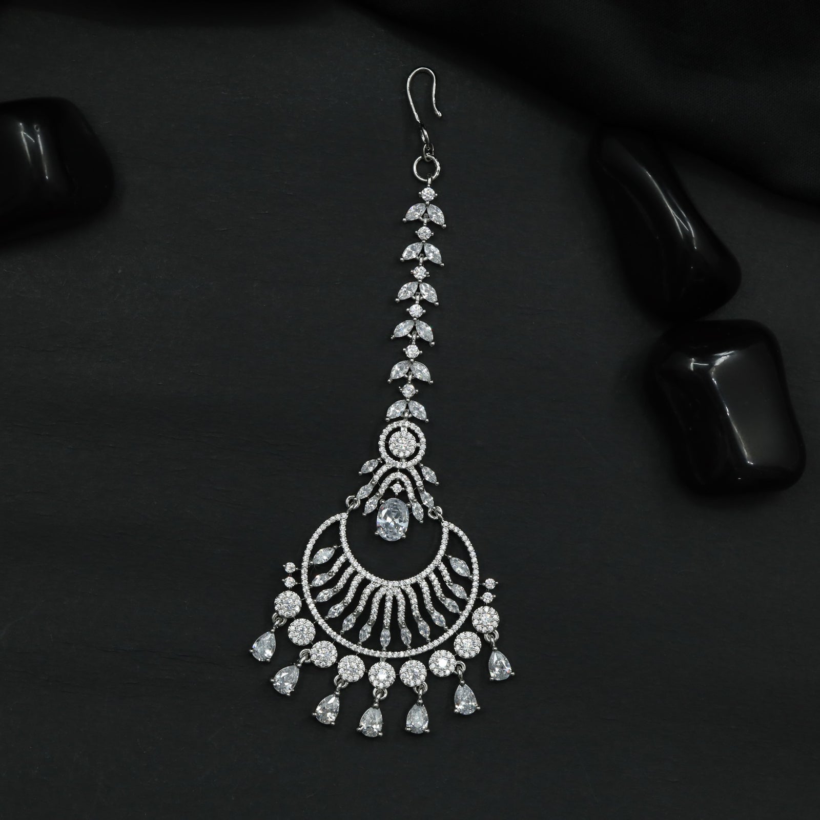 Tikka Featuring Layered Crescent Motifs and Fringe Detail