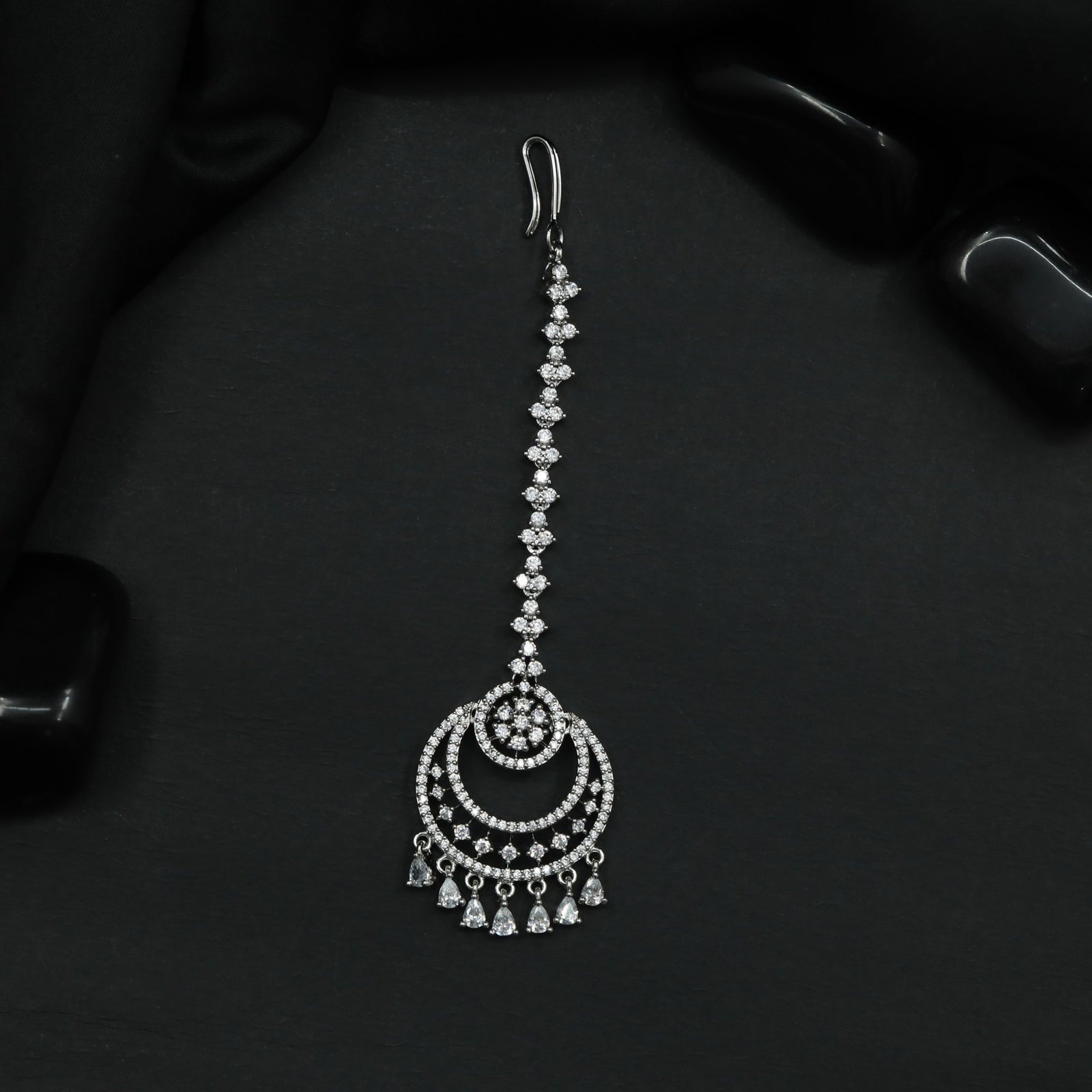 Radiant Rhodium Tikka with Circular Openwork Pendant and Cascading Drops